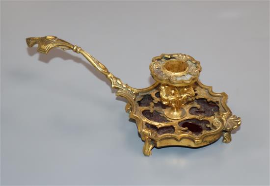 A French ormolu and glass chamberstick